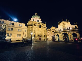 Fototapeta na wymiar Prague, Czech Republic 3.1.2021 - Empty night Prague during the covid lockdown. Charles bridge museum. 