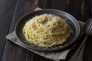Roman pasta spaghetti with black pepper and cheese. Cacio e pepe. Recipes. Wine.