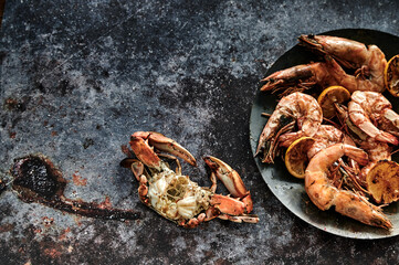 Yummy seafood of grilled shellfish on table