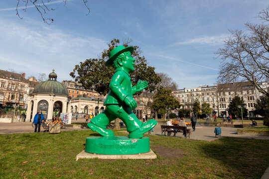 green Ampelmann as symbol for the german reunification in Wiesbaden, germany by artist Ottmar Hoerl