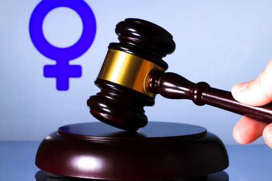 Judge mallet and gender symbol on white background - Powered by Adobe