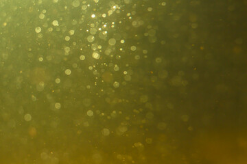 Abstract glitter gold bokeh