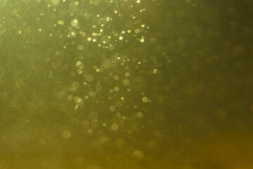 Abstract glitter gold bokeh