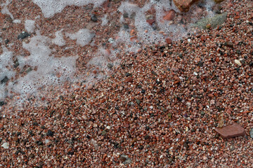 Red Sand and Stones of the red Sea Coast, Natural Texture Background