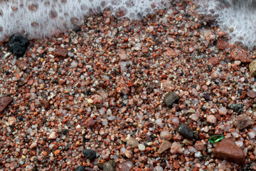 Red Sand and Stones of the red Sea Coast, Natural Texture Background