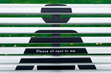 Concept of social distance of bench in public park