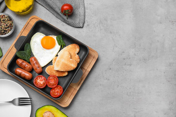 Romantic breakfast on grey table, flat lay with space for text. Valentine's day celebration