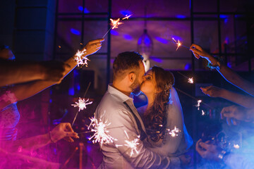 bride and groom in the center of the wedding