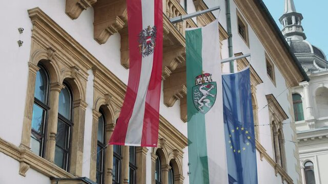 The flags of Austria, Styria and the EU at the Landtag in Graz