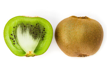 Kiwi fruit cut on two isolated on white background top view. Pulp and skin of kiwi. Fresh, tropical citrus fruit. Vitamin rich food