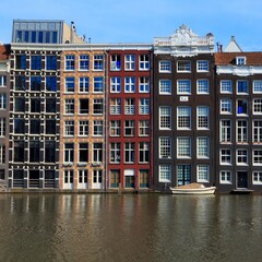 Amsterdam Damrak Canal. Netherlands architecture. Amsterdam landmarks.