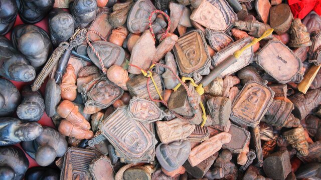 Thailand culture - stone amulets. Bangkok amulet market in Thailand.