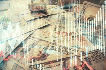 Multi exposure of forex chart drawing over us dollars bill background. Concept of financial success markets.