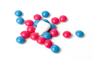 Sweet candy and tooth isolated on white background. Prevention of caries in children.