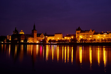 Obraz na płótnie Canvas Long exposure night photography on the Vltava river in Prague, Czech Republic