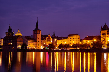 Fototapeta na wymiar Long exposure night photography on the Vltava river in Prague, Czech Republic