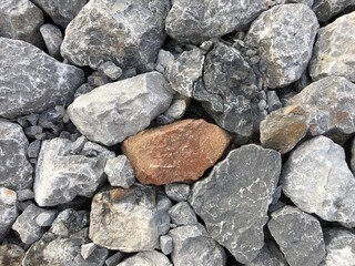 The background image of gray rocks is random stacked beautifully.