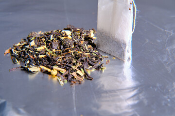 Healing collection of dried herbs, fruits, tea and tea bag for brewing. Close-up. Selective focus