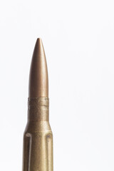 Large-caliber bullet in the background. Weapon. Picture to illustrate weapons.