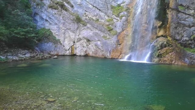 slow motion beautiful small waterfall salza waterfall while hiking