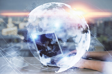 Multi exposure of woman hands typing on computer and business theme hologram drawing. Success...