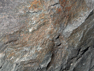 Various stone slabs of granite, basalt or sandstone, as background