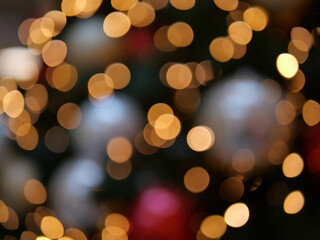 Christmas bokeh of lights and Christmas tree decorations