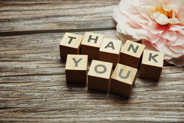 Thank You alphabet letters with space copy on wooden background