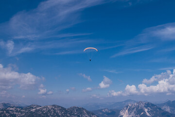 skydiver is playing with his life overDachstein Krippenstein at a height of 2.5 km. A man with a...