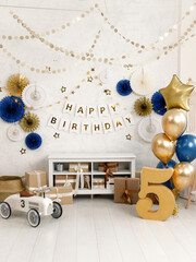 Birthday decorations - gifts, toys, balloons, garland and number for little baby party on a white...