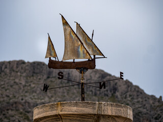wind direction meter as a  sailing ship in port of pollensa, majorca, spain