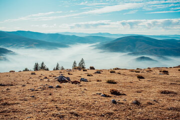 beautiful mountain peaks in the morning mist