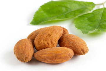 A pile of Almonds, isolated on a white background.