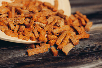 salty croutons snacks delicacy meal wooden table