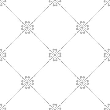 Small flower in diamond grid vector seamless pattern. Arabesque geometric simple symmetrical motif block printing. Indian floral elegant oriental style design. Oriental frieze background. 