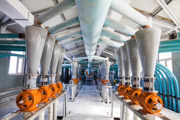 Aktobe region, Kazakhstan - May 06, 2012: Wheat flour production line. Electric motors with cone...
