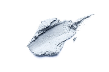 Smear of cosmetic clay isolated on a white background.