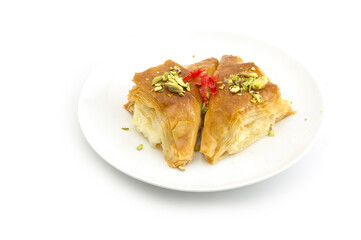 Oriental Arabic sweet warbat with qishta, kadayif, kunafa, with pistachio and cheese.