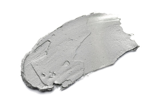 Smear of cosmetic clay isolated on a white background.