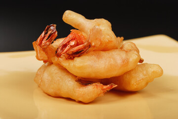 Prawns baked in dough on a plate