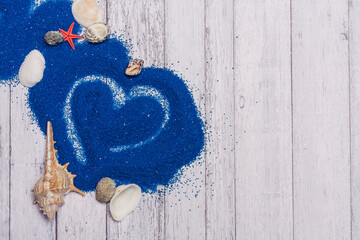 seashells decoration blue sand wooden background scenery ocean