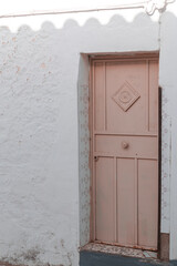 Door of a rustic house in a village