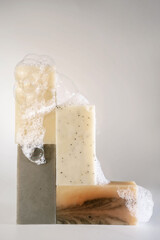 Soap with foam stands on a white background. © Marevgenna