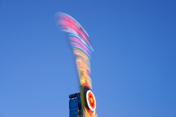 Amusement park blurred effect. Abstract illuminated background