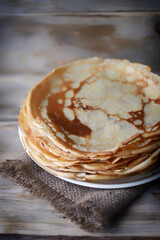 A stack of pancakes on a plate. Maslenitsa.