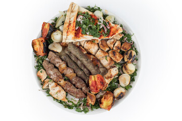 Lebanese Mixed Grill plate isolated on white, Clipping path included.