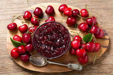 bowl of cherry jam with fresh fruits, top view