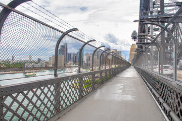 Sydney Harbour Bridge on a cloudy day, city view from the bridge