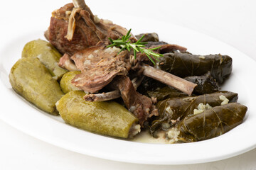 lebanese food - cooked zucchini with rice, grape leaves stuffed with rice and meat castaletta, Arabian food of Zucchini with rice, Grape leaves and Ribs.