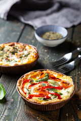 Various mini quiches on the table